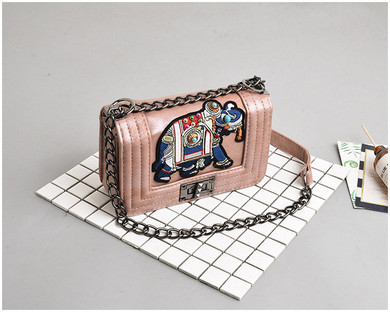 Embroidered elephant shoulder bag