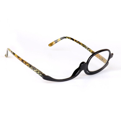 New glasses help shortsighted woman apply make-up New glasses help shortsighted woman apply make-up