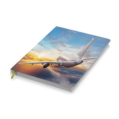 Airliner Jet Cruising over Clouds Designed Notebooks