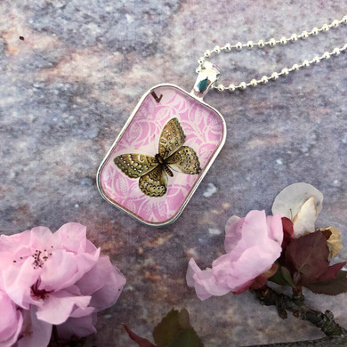 butterfly necklace, 1971 postage stamp, pink pendant