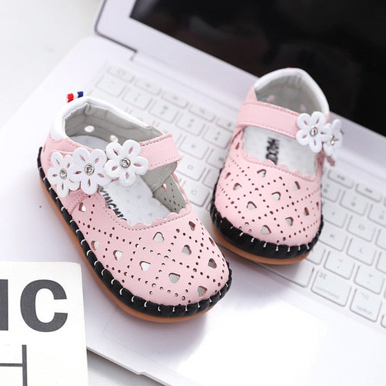 Girls cute shoes with flower design