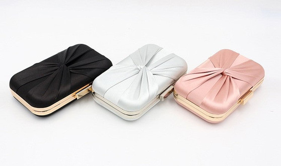 THE HEIRLOOM - HANDMADE BOW CLUTCH BAG