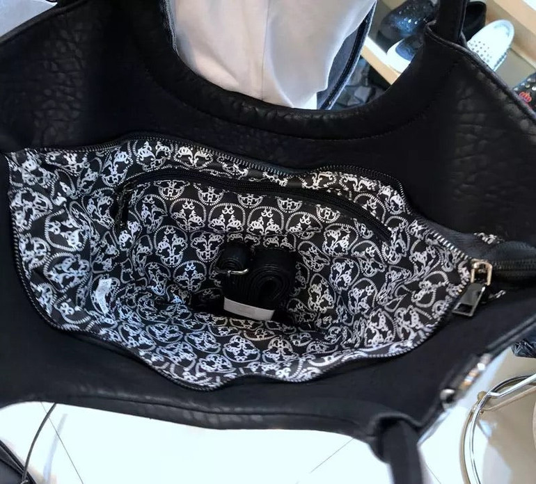 Leather and skull head rivets bag