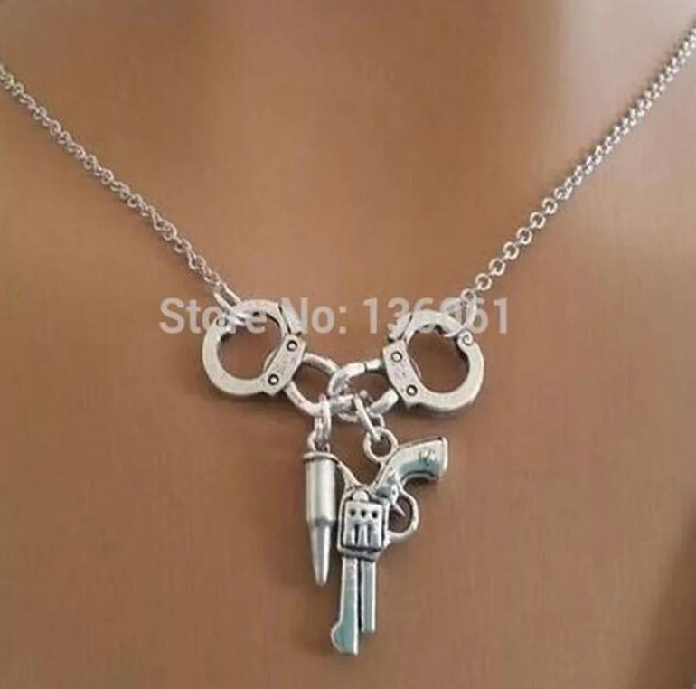 Guns and handcuff necklace