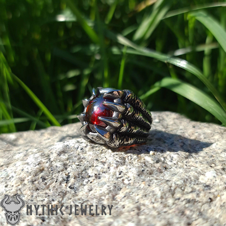 Dragon Claw Ring Holding Red Gemstone