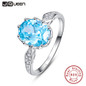 JQUEEN 4ct Blue Topaz Gem Stone Rings 925 Sterling Silver Oval Cut bijoux anel female Ring for Women Fine Jewelry With Gift box