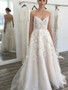 A-line Ivory Spaghetti Straps Backless Tulle Beach Wedding Dress with Lace