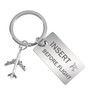 Insert Before Flight Tagged Airplane Key Chain
