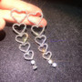 descending heart earrings