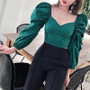 Polka dot puff sleeve top in green