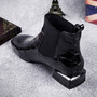 Black patent leather flat ankle boots