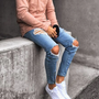 Light Wash Ripped Denim Jeans with Front Zip Detail