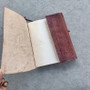 OM Embossed Brown Leather Journal