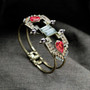 Deco Cuff Bracelet With Red Gemstones
