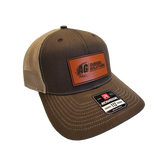 Brown and tan AG Diesel Solutions Patch Richardson 115 Hat with an embroidered AG Diesel Solutions patch on the front, featuring a structured mid-profile design and adjustable snapback closure