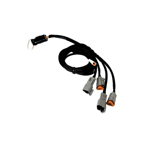 PSI Power Performance Module for C7 and C9 CAT Engines, featuring a black control unit with durable wiring harness and plug-in connectors.