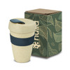 A drink bottle in a natural beige colour with a navy band, accompanied by a cardboard box featuring leaf designs.