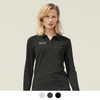 A long sleeve polo shirt in black, worn by a woman, featuring a logo on the left side.