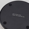 A Bamboo 15W wireless fast charger in a sleek black design, featuring a smooth surface and rubberised base for stability.
