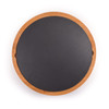 A round cheese board featuring a bamboo edge and a smooth slate surface.