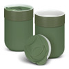 A green ceramic coffee cup set with a lid, featuring a smooth finish and simple design.