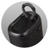 A black outdoor Bluetooth speaker with a textured surface and a carrying loop on top. It features a USB input.