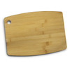 A bamboo chopping board in a natural wood colour with a rounded edge and a hole for hanging.