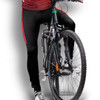 Custom men's cycling pants in black with red accents, featuring a branding logo, paired with a bicycle.