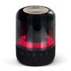 A black and transparent Bluetooth speaker with a rounded design and red illumination at the base. It features a logo.