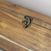 A wooden wine box featuring a brass latch, showcasing a rich brown finish and rustic design.