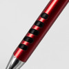 A red metal pen featuring a sleek design with black grip accents and a shiny silver tip.