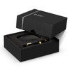 A black box containing Swiss Peak ANC TWS earbuds, with gold accents and a soft inner lining.
