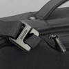A close-up of a black anti-theft backpack featuring a sturdy buckle and zipper detail. It has a sleek, modern design.