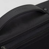 A black anti-theft backpack briefcase with a textured handle and a branding logo on the top.