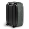 A medium wheeled suitcase in dark green fabric and black hard shell, featuring a logo.