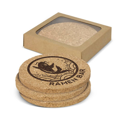 A round set of four natural cork coasters featuring a fish design, packaged in a simple box.