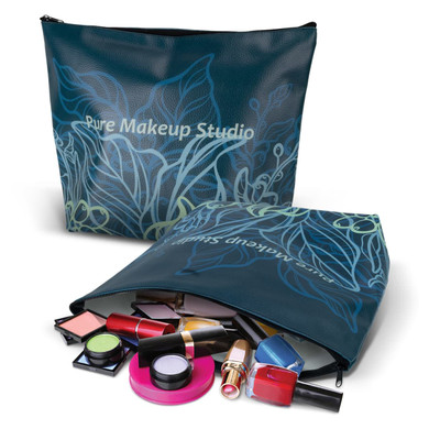 A large teal cosmetic bag with leaf designs, partially filled with various makeup products and a logo.