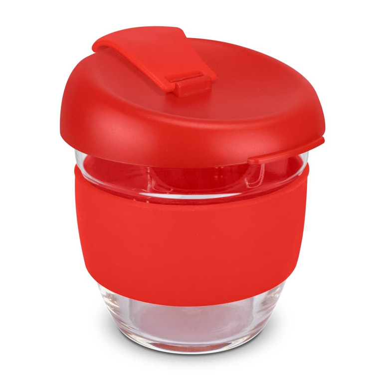 A drink bottle in red, featuring a silicone band and a lid, made of borosilicate glass.