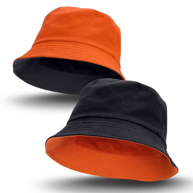 A reversible bucket hat featuring orange on one side and black on the other, with a brand logo present.