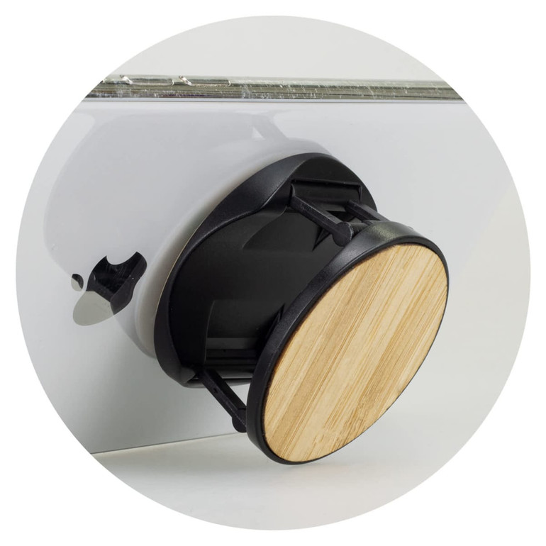 A bamboo phone holder with a black base, designed to securely hold smartphones.