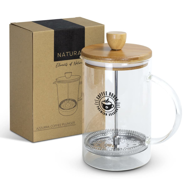 A glass coffee plunger with a bamboo lid and handle, presented alongside its kraft packaging.