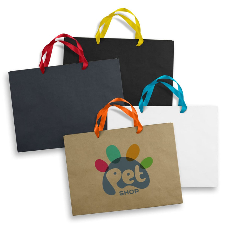Four extra large ribbon handle paper bags in black, brown, white, and blue, each featuring a different colour handle.