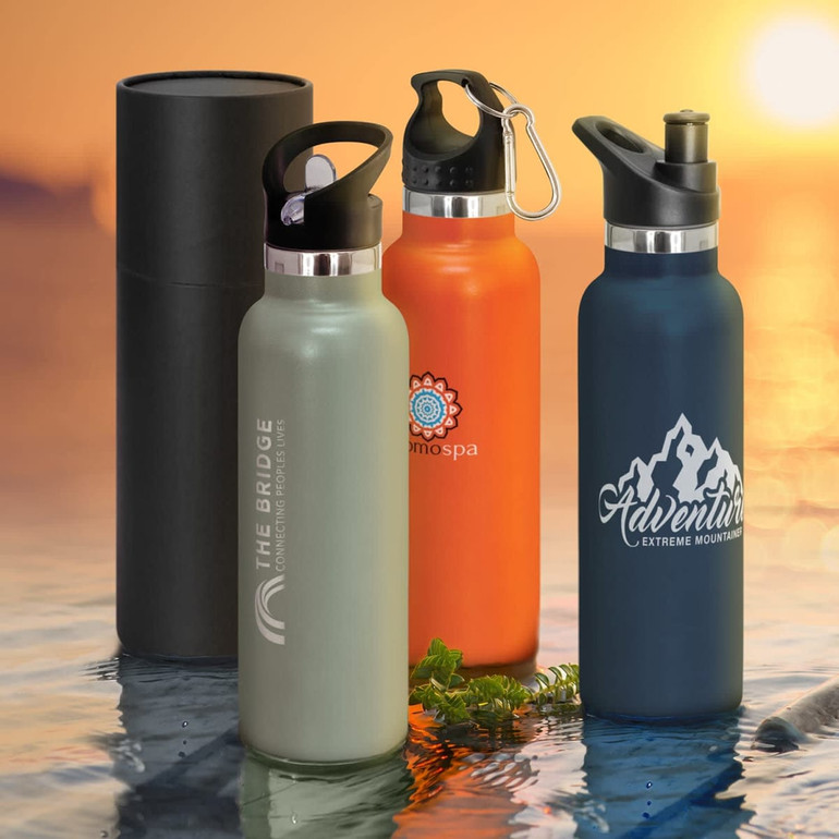 A drink bottle trio featuring grey, orange, and dark blue powder-coated vacuum bottles, with one bottle in a black holder.