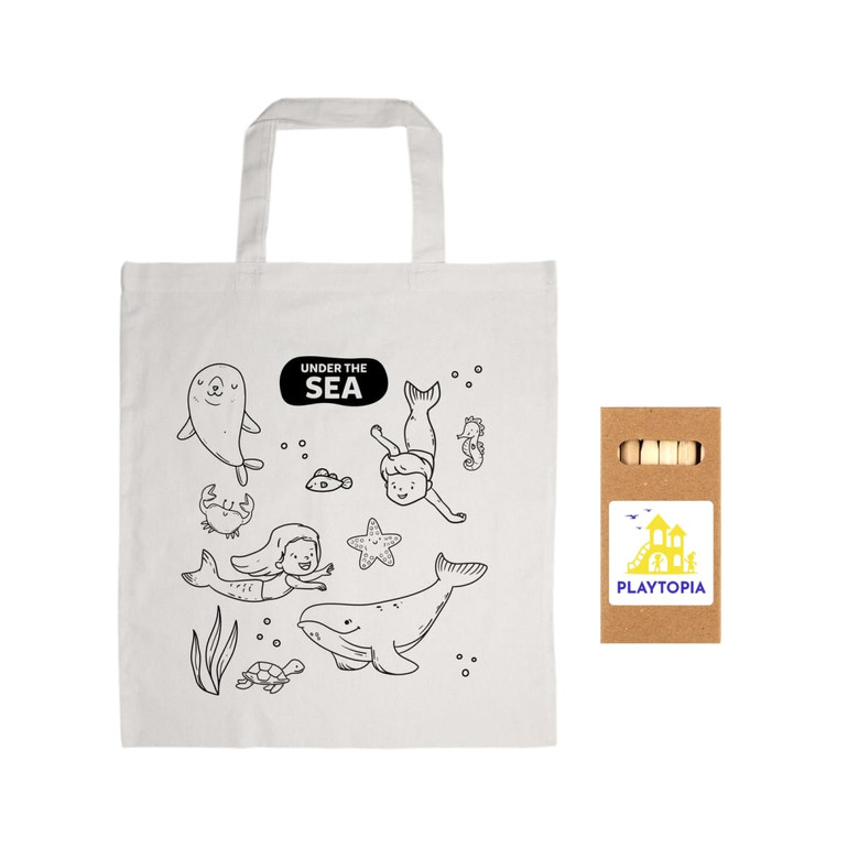 A natural cotton bag featuring sea-themed coloring designs and a box of colored pencils.