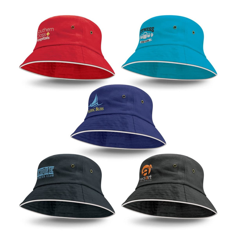 A collection of five bucket hats in various colours: red, blue, navy, black, and dark green, each featuring different logos.