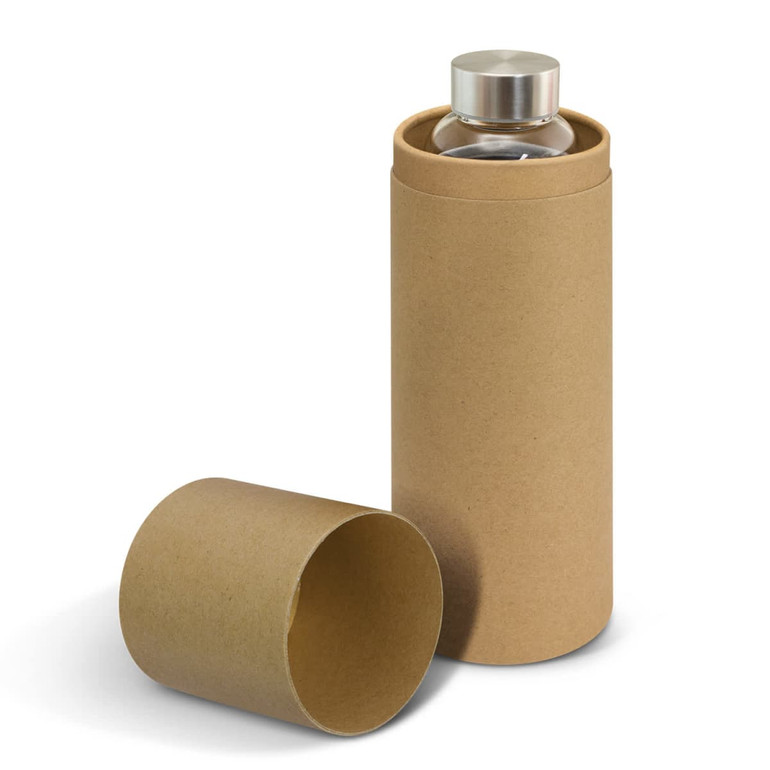 A drink bottle with a transparent glass body and a silver lid, packaged in a natural cardboard sleeve.