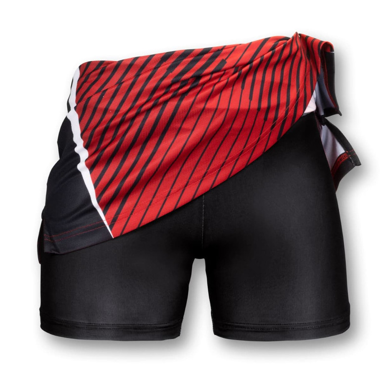 A red and black custom women's netball skirt with a striped design, featuring a fitted black undershort and a logo.