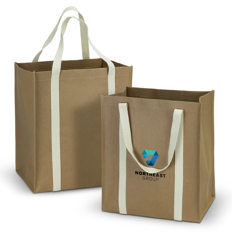 Two kraft tote bags in brown with light green handles, featuring a logo on the front of one bag.