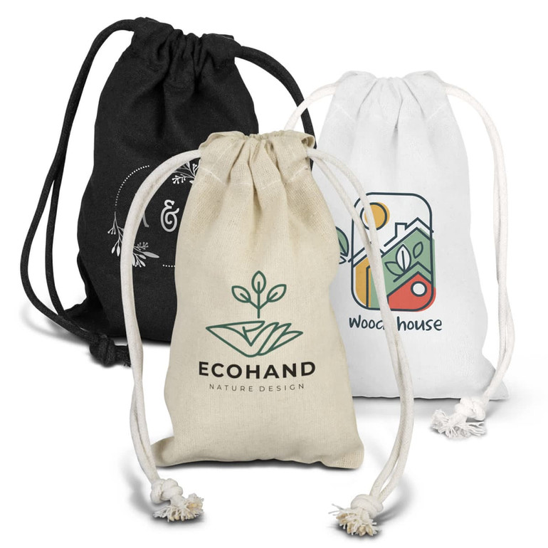 Three small cotton gift bags in black, white, and natural tones, each with a different design and logo.