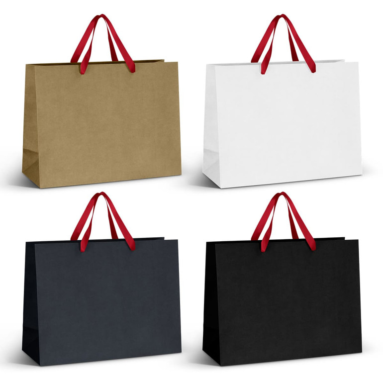 Extra large paper bags in gold, white, and black with red ribbon handles and a logo.